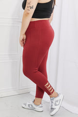 Yelete Ready For Action Full Size Ankle Cutout Active Leggings in Brick Red