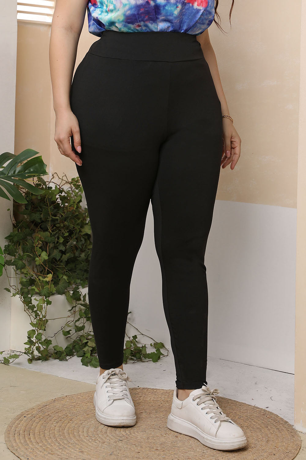 Pantalones ajustados de talla grande