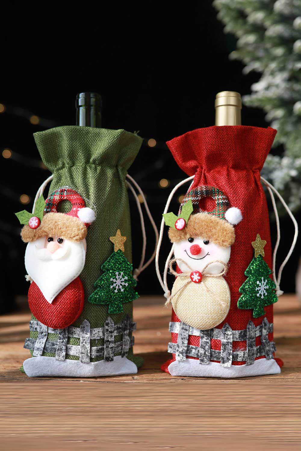 Paquete de 4 fundas navideñas con cordón para botellas de vino