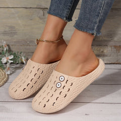 Sandalias planas de PVC con punta redonda