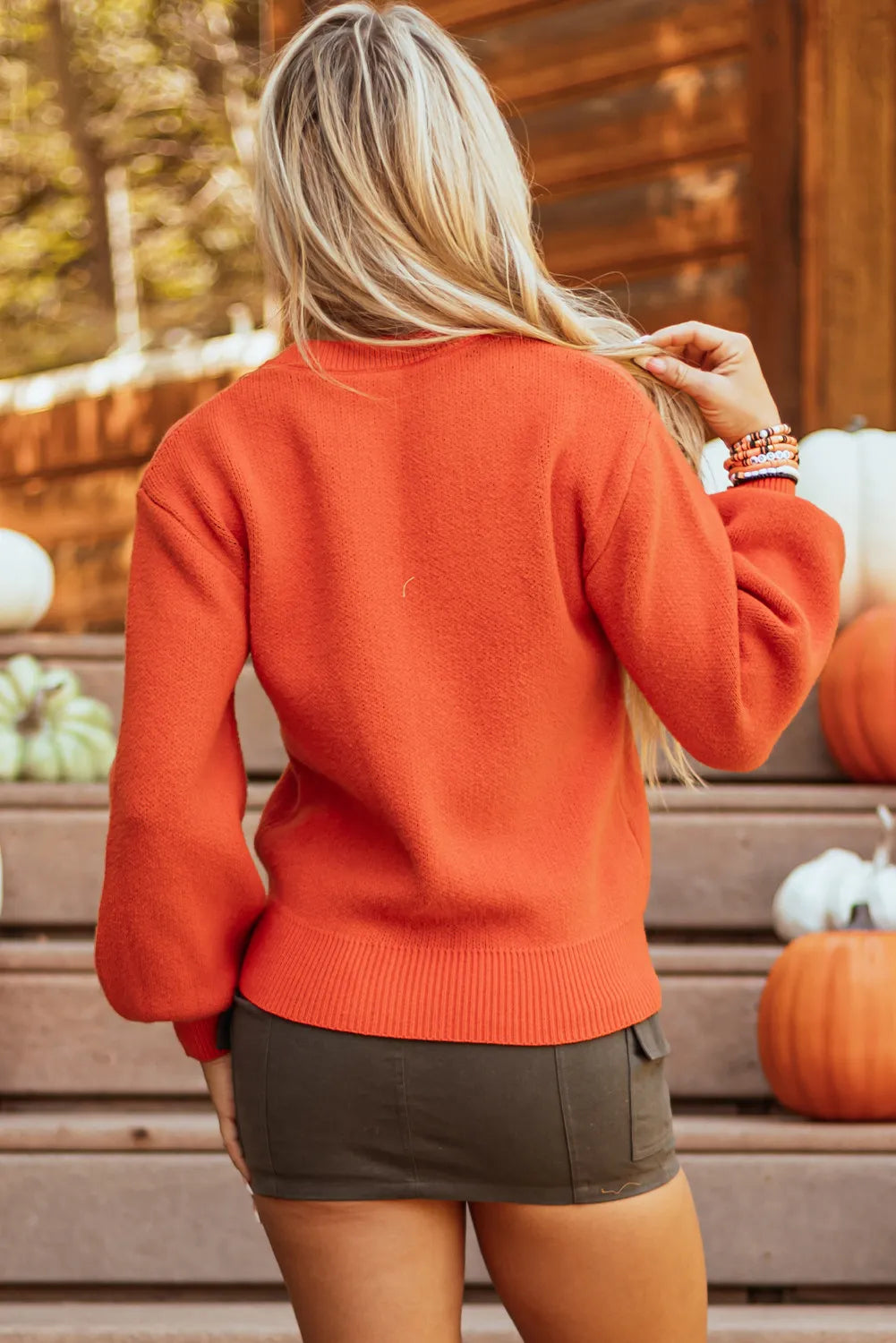 Suéter de cuello redondo con estampado de calabaza