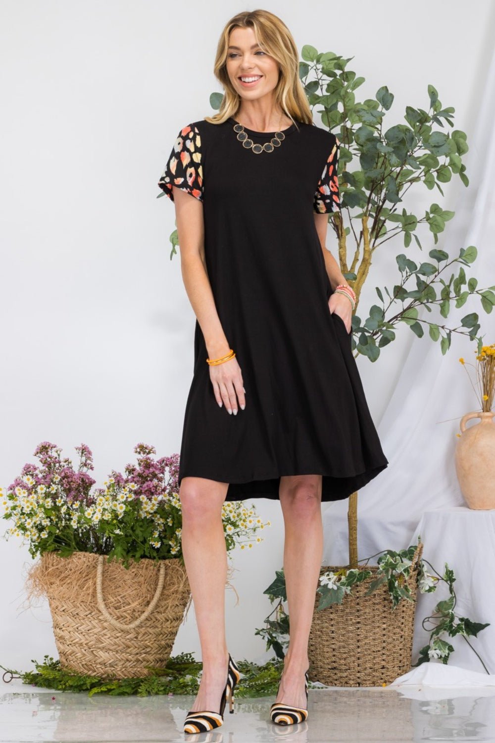 Celeste Full Size Leopard Short Sleeve Dress with Pockets - Admiresty