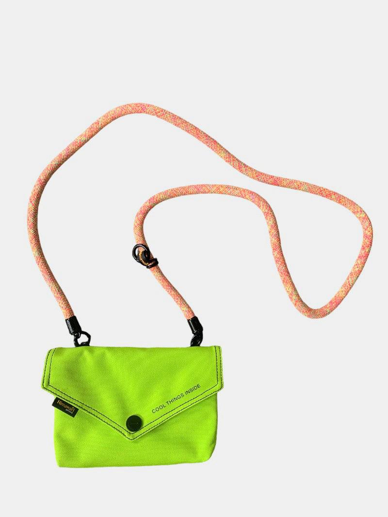 Bolso bandolera Himawari de color liso con forma de sobre y correa extraíble